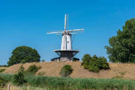 Windmill De Koe at the former bastion in Veere. Veere is a city in the province of Zeeland in the Netherlandsの写真素材