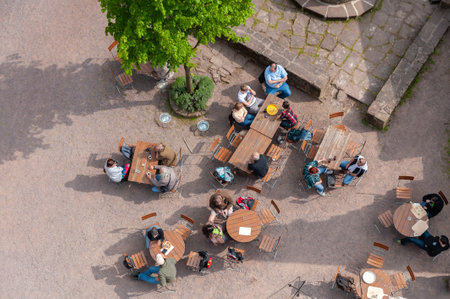 Klingenmuenster, Germany - April 17, 2021: Beer garden in the castle yard of Landeck Castle near Klingenmuenster. Region Palatinate in the federal state of Rhineland-Palatinate in Germanyのeditorial素材