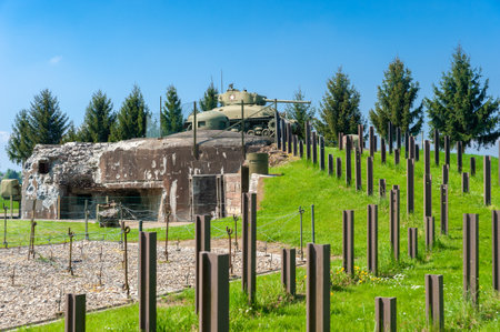Hatten, France - May 05, 2022: Reconstruction of Esch casemate near Hatten as part of Maginot Line with barbed wire enclosure, anti-tank rails and M4 Sherman tanks. Bas-Rhin department in the Alsace region of Franceのeditorial素材