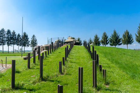 Hatten, France - May 05, 2022: Reconstruction of Esch casemate near Hatten as part of Maginot Line with barbed wire enclosure, anti-tank rails and M4 Sherman tanks. Bas-Rhin department in the Alsace region of Franceのeditorial素材