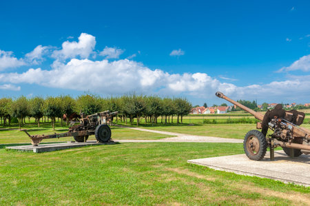 Hatten, France - August 20, 2021: Artillery guns from World War II in Musee de l'Abri in Hatten, Bas-Rhin department in the Alsace region of Franceのeditorial素材