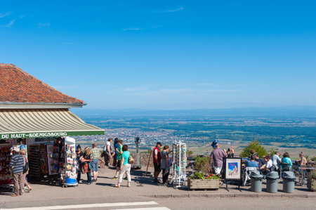 Orschwiller, France - September 16, 2021: Tourists at viewpoint in front of ChÃ¢teau du Haut Koenigsbourg near Orschwiller. In background Upper Rhine Plain and hilly landscape of Black Forest. Bas-Rhin department in Alsace region of Franceのeditorial素材