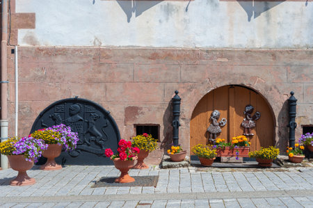 La Petite-Pierre, France - July 27, 2021: Scene in so-called Im Staedtel in La Petite-Pierre with historic cellar entrance on Rue du Chateau. Bas-Rhin department in Alsace region of Franceのeditorial素材