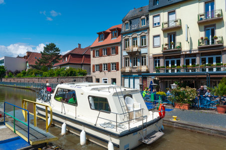 Saverne, France - May 26, 2022: Houseboat in lock of Rhine-Marne Canal in Saverne. Department Bas-Rhin in the Alsace region of Franceのeditorial素材