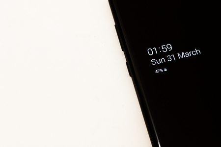 Phone screen with a displayed date of time change in 2019