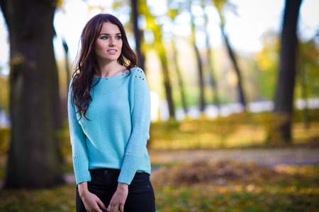 Cute woman posing in parkの写真素材