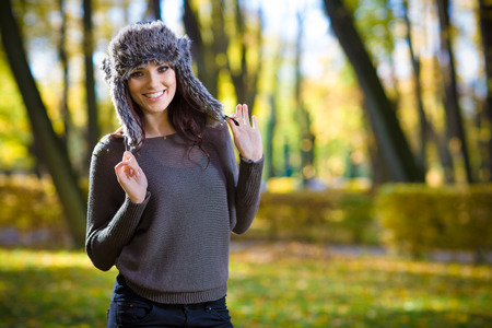 Young woman in Autumn park