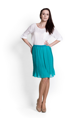 Glamour girl in dress on whiteの写真素材