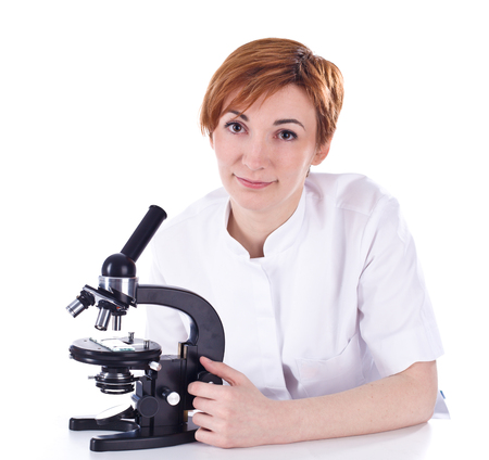 Scientist looking through a microscope