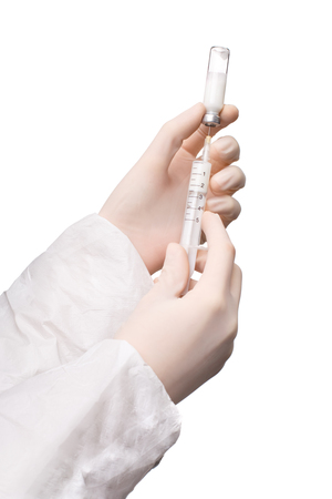 Medicine drawn into syringe isolated on white backgroundの写真素材