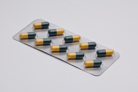 Pills in blister on grayの写真素材