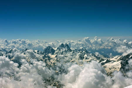 Summer mountains in Caucasus and cloudsの写真素材