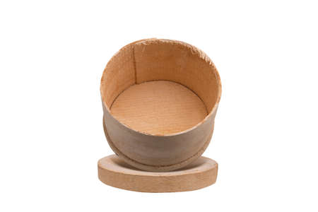 Opened natural wooden round box isolated on white background