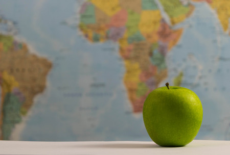 Grean apples around the world.の写真素材