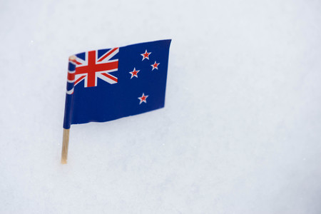 Australia flag made from paper with brown toothpick on white snow background.の写真素材