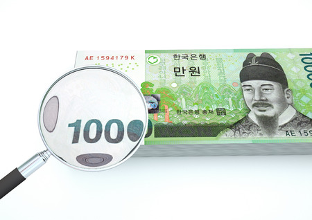3D Rendered South Korea money with magnifier investigate currency isolated on white backgroundの写真素材