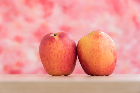 apples for diet and healthy in pink backgroundの写真素材