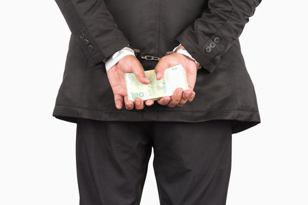 The Businessman is arrest because fraud and corruptionの写真素材