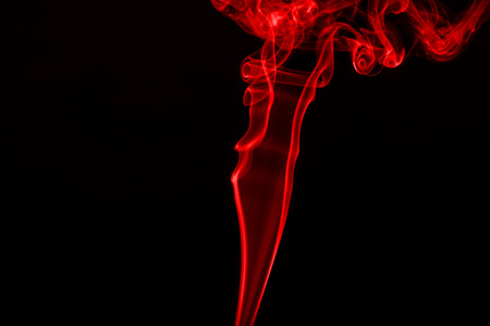red smoke abstract on black background with copy space, concept red styleの写真素材