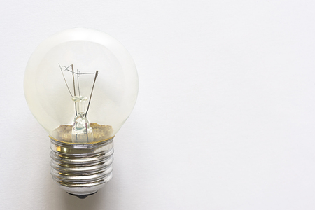 Closeup electronic bulb lamp on white background with copy space, idea or energy conceptの写真素材