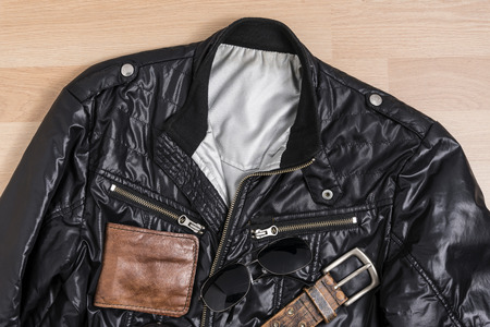 Men casual trendy fashion with Black jacket and accessories on wooden table still life styleの写真素材