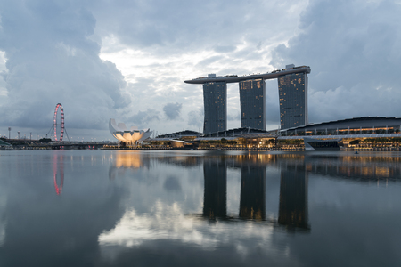SINGAPORE CITY, SINGAPORE - AUGUST 9, 2016: Marina Bay Sands, Art Science Museum with twilight sky in the morning, Marina Bay located in the Central Area of Singapore, Singapore on AUGUST 9, 2016のeditorial素材