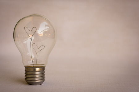 love hearts inside light bulb with copy space ,vintage style design for loverの写真素材