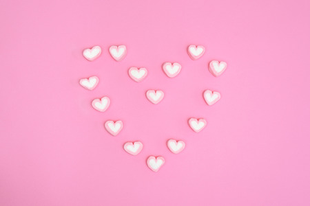 Sweet heart candy  on pink background, minimal style
の写真素材