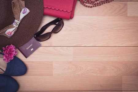 Overhead view of woman traveler accessories, Essential vacation items, Travel concept backgroundの写真素材
