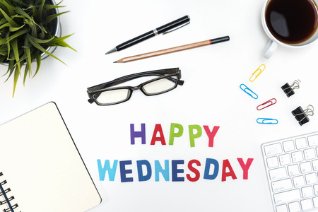 Office desk table with supply, pen, pencil, notebook, computer, eye glasses, sticky note, cup of...