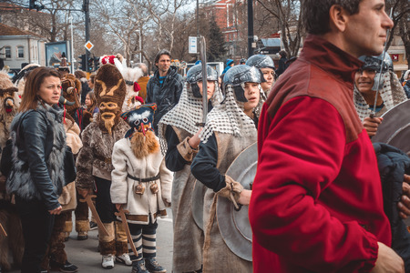 Varna, Bulgaria, March 26, 2016: Thousands of citizens in festive carnival masks, masquerade, theatrical and folk costumes, including many children and teenagers, took part in the annual Varna Spring Carnival.のeditorial素材