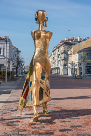 Varna, Bulgaria, March 29, 2017: A beautiful modern sculpture "The Walk" made of brass and stained glass by artist Veselin Kostadinov was installed in the popular meeting point in the center of Varna city.のeditorial素材