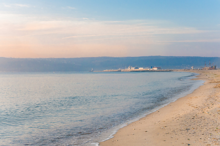 Deserted sea beach at sunrise, copy space seascape.の写真素材
