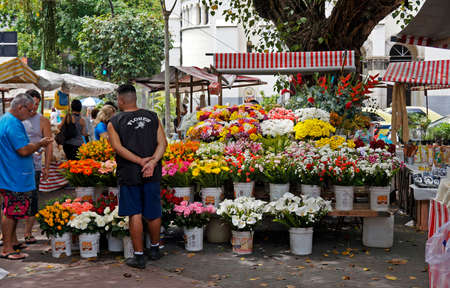 Rio de Janeiro, Brazil - December 20, 2019: Flowers seller on marketplace in the neighborhood of Ipanema.のeditorial素材
