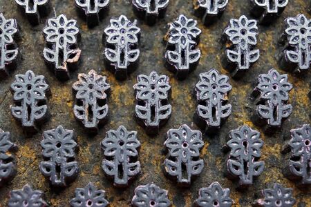 Traditional Indian block print (detail). Wood block used for handmade textile printing.の写真素材