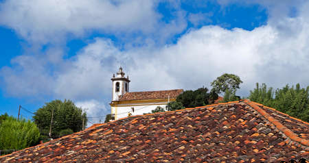 Roof and baroque church in Ouro Preto, Brazilの写真素材