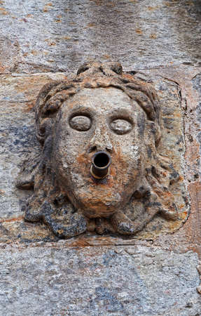 Ancient fountain built in 1759 (detail) at historical city of Ouro Preto, Brazilの写真素材