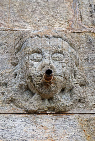 Ancient fountain built in 1759 (detail) at historical city of Ouro Preto, Brazilの写真素材