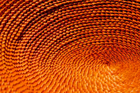 Handicraft with straw in orangeの写真素材