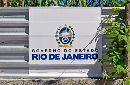 RIO DE JANEIRO, BRAZIL - FEBRUARY 22, 2023: Sign indicating that the land belongs to the Government of the State of Rio de Janeiroのeditorial素材