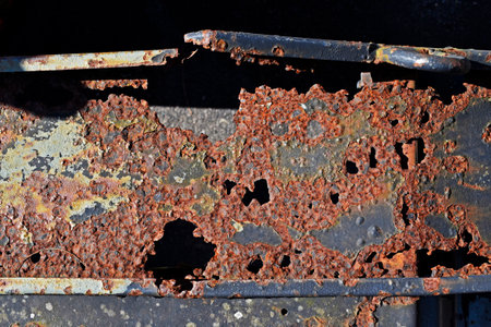 Metal corroded by rust texture backgroundの写真素材