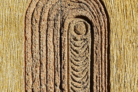 Abstract texture on yellow wall