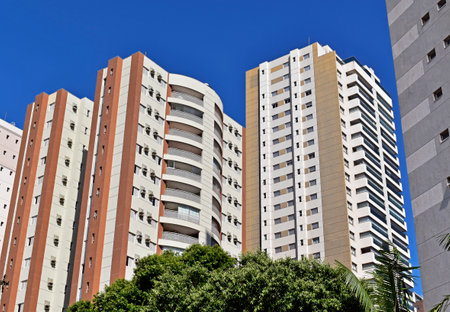 Residential building facades and trees, Ribeirao Preto, Sao Paulo, Brazilの写真素材