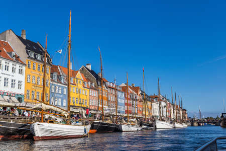Copenhagen, Denmark - September 18, 2018: Cityscape of Nyhavn Pier with Colorful Buildings and...