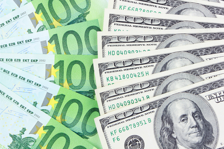 Stack of euro and dollar banknotesの写真素材