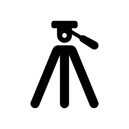 Camera tripod icon features a simple black silhouette on a white background This graphic symbolizes photography equipmentのイラスト素材