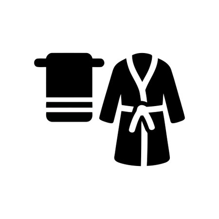 Towel and bathrobe black icon illustration depicting comfortable items for bathroom spa and hygieneのイラスト素材