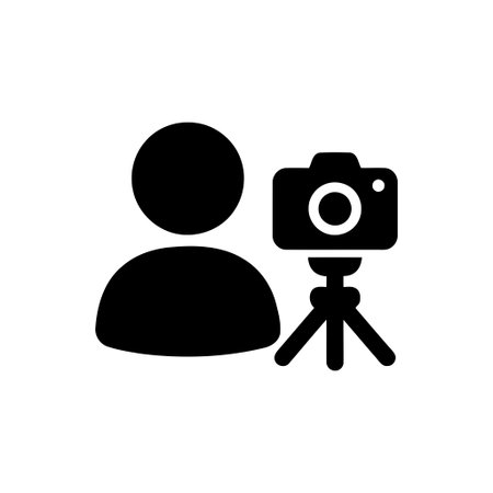 Photographer icon representing a content creator with a digital camera on a tripod symbolizing...