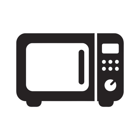 Microwave icon silhouette shows a compact kitchen appliance with a door and control panel Its bold black shape communicates clarity and modern designのイラスト素材