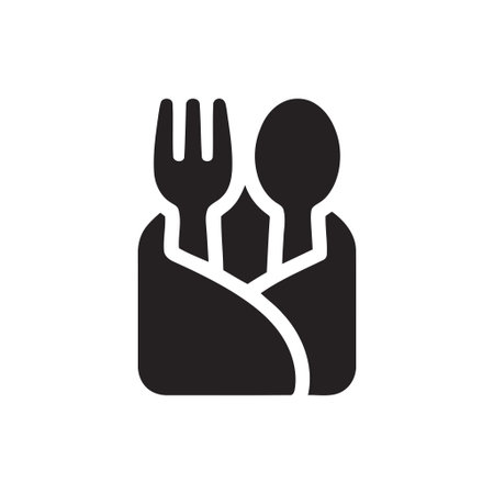 Cutlery utensil set featuring a spoon and fork neatly wrapped in a napkin for dining service